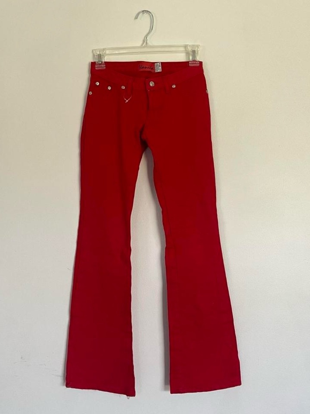 Red low rise flare jeans.